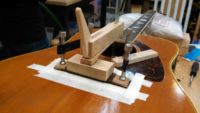 Gluing a guitar bridge